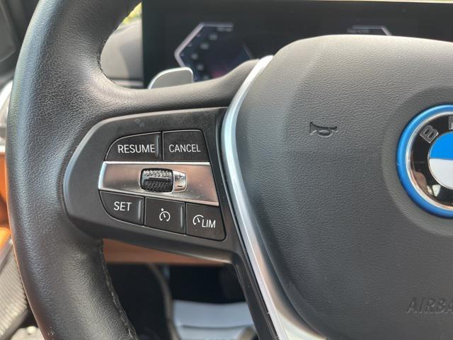 used 2023 BMW 330e car, priced at $25,000