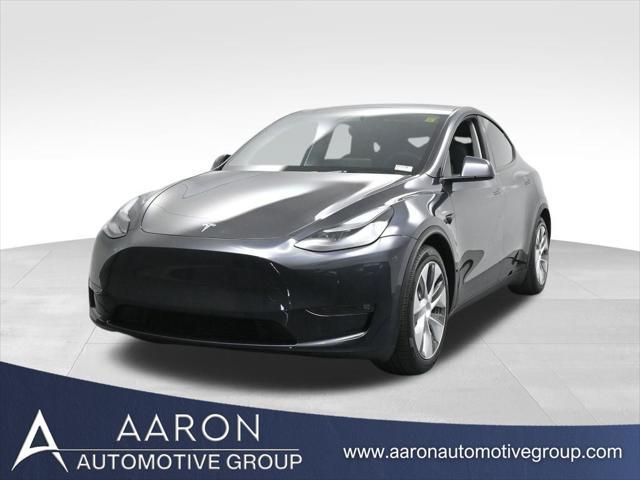 used 2025 Tesla Model Y car, priced at $41,603