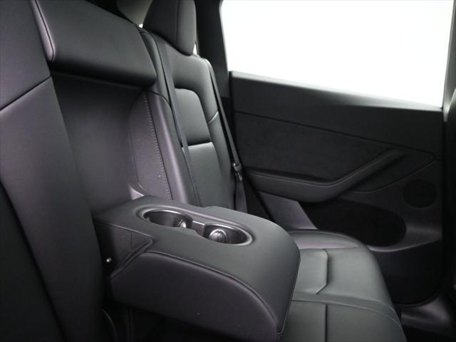 used 2025 Tesla Model Y car, priced at $41,603
