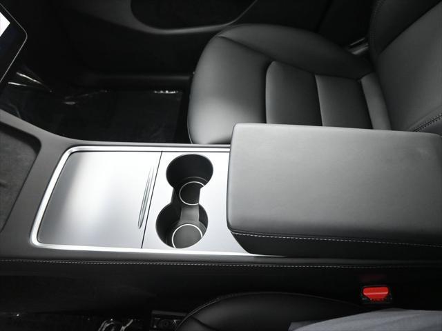 used 2025 Tesla Model Y car, priced at $41,603