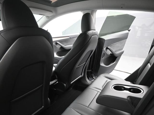 used 2025 Tesla Model Y car, priced at $41,603