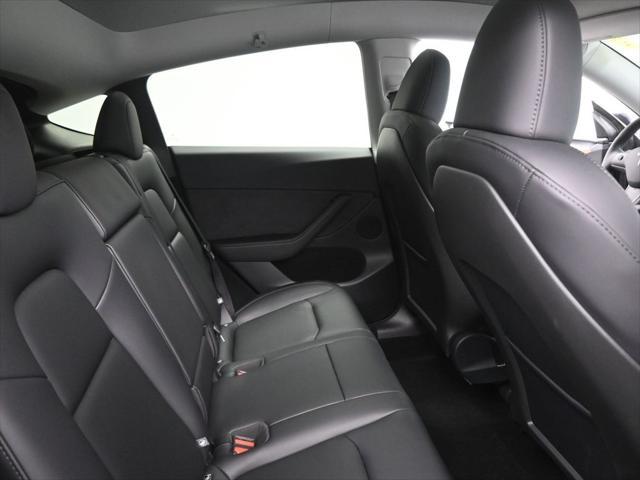 used 2025 Tesla Model Y car, priced at $41,603