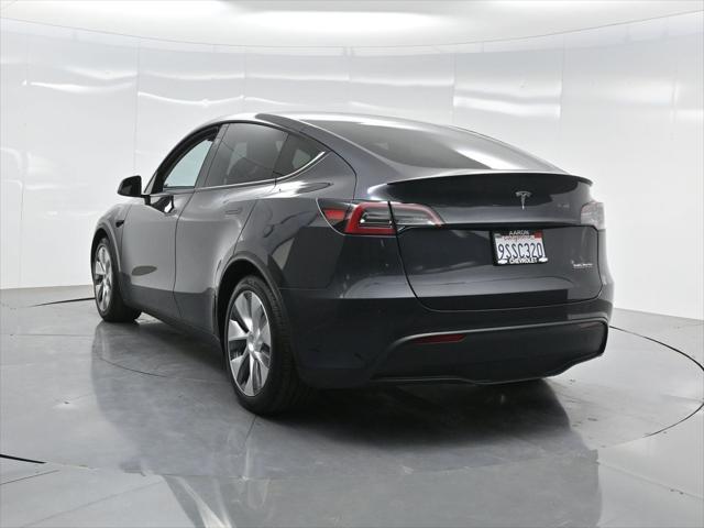 used 2025 Tesla Model Y car, priced at $41,603