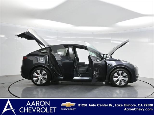 used 2025 Tesla Model Y car, priced at $41,603