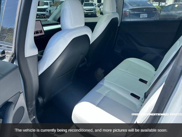 used 2022 Tesla Model Y car, priced at $27,845