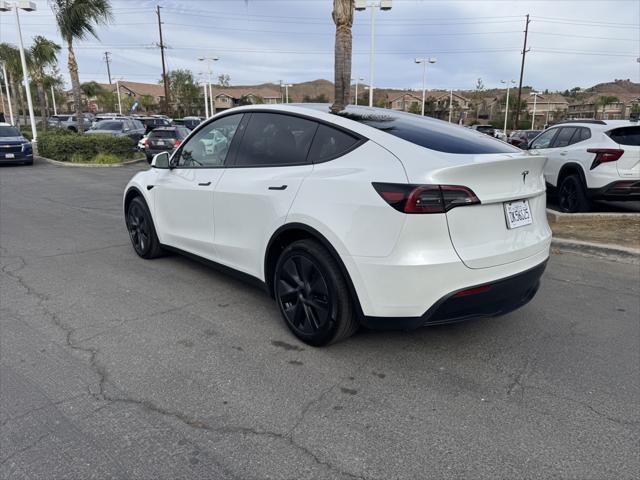 used 2024 Tesla Model Y car, priced at $36,999