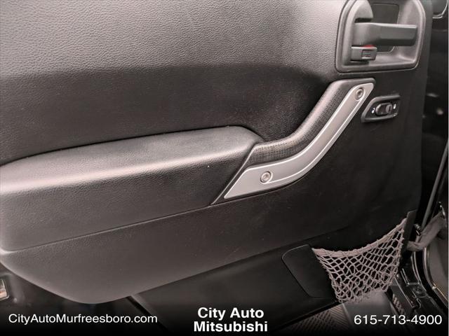 used 2013 Jeep Wrangler Unlimited car, priced at $16,988
