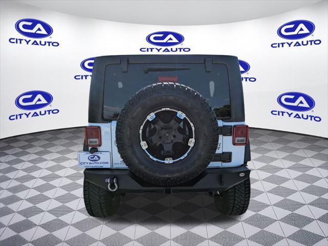 used 2016 Jeep Wrangler Unlimited car, priced at $23,988