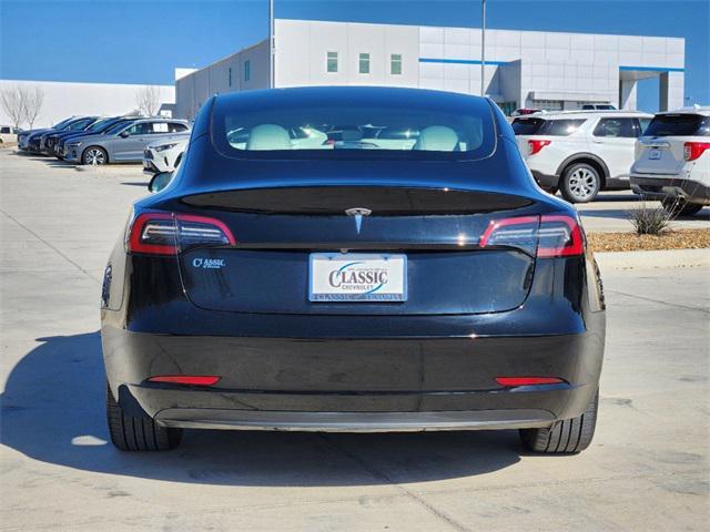 used 2023 Tesla Model 3 car, priced at $27,309