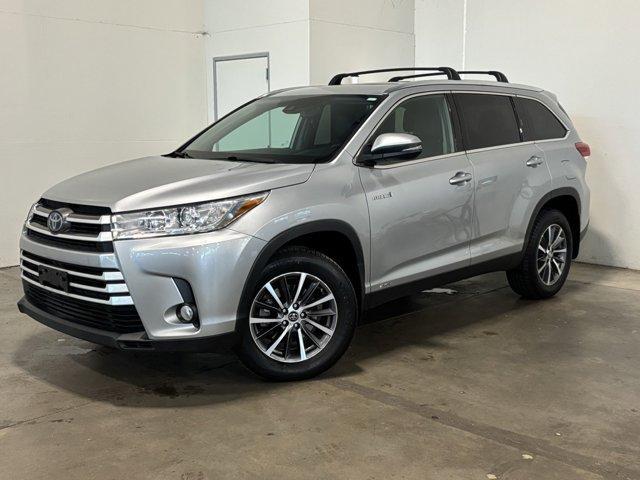 used 2019 Toyota Highlander Hybrid car, priced at $26,991