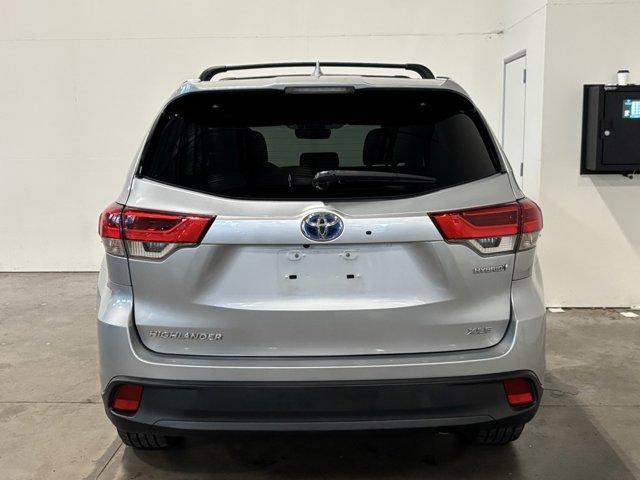 used 2019 Toyota Highlander Hybrid car, priced at $26,991