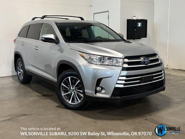 used 2019 Toyota Highlander Hybrid car, priced at $26,991