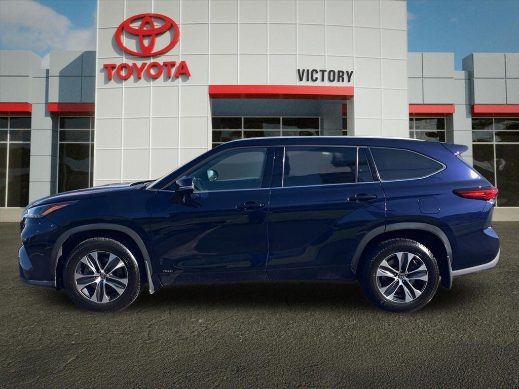 used 2022 Toyota Highlander Hybrid car, priced at $30,146