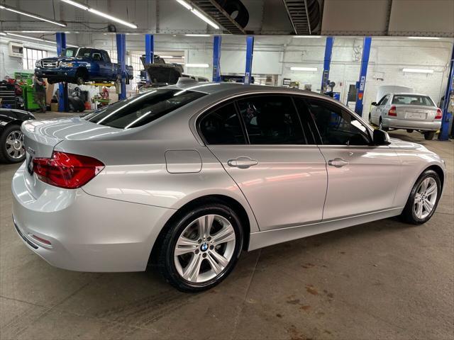 used 2018 BMW 330 car, priced at $27,995
