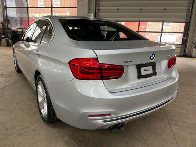 used 2018 BMW 330 car, priced at $27,995