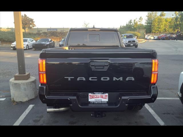 used 2024 Toyota Tacoma car, priced at $49,995