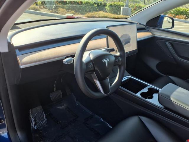 used 2024 Tesla Model Y car, priced at $33,595