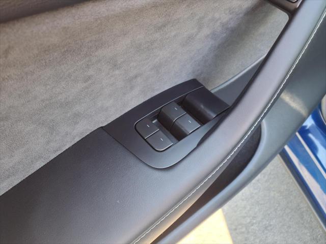 used 2024 Tesla Model Y car, priced at $33,595