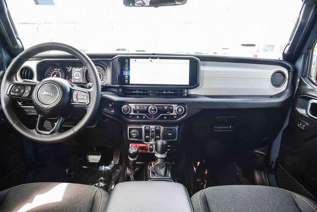 used 2025 Jeep Wrangler car, priced at $38,198