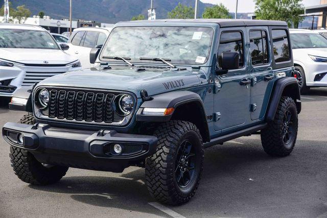 used 2025 Jeep Wrangler car, priced at $38,198