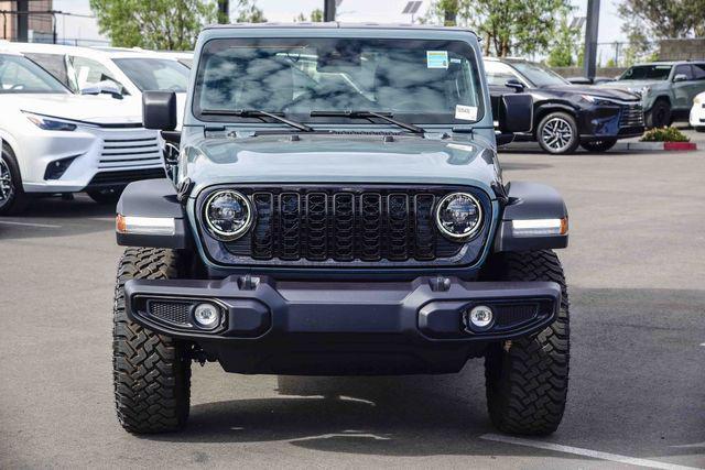 used 2025 Jeep Wrangler car, priced at $38,198