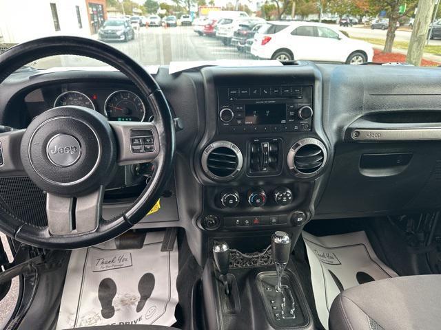 used 2016 Jeep Wrangler Unlimited car, priced at $17,329