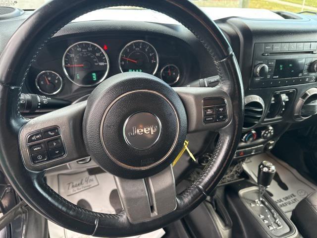 used 2016 Jeep Wrangler Unlimited car, priced at $17,329