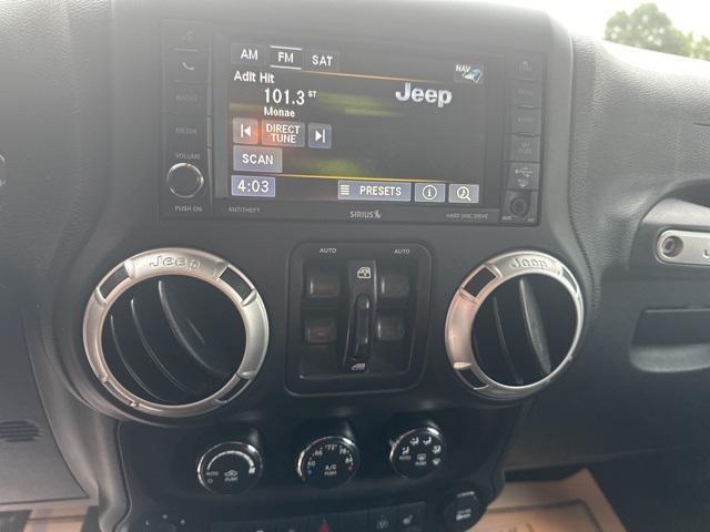 used 2016 Jeep Wrangler Unlimited car, priced at $19,349