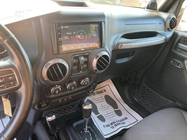 used 2014 Jeep Wrangler Unlimited car, priced at $16,008