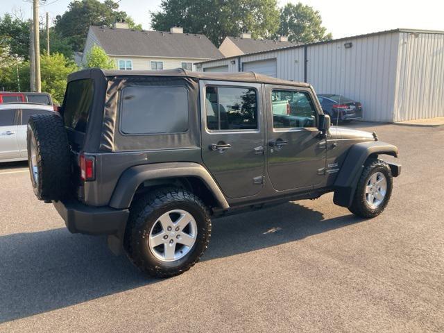 used 2014 Jeep Wrangler Unlimited car, priced at $16,008