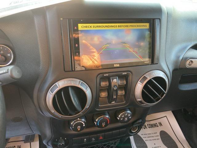 used 2014 Jeep Wrangler Unlimited car, priced at $16,008