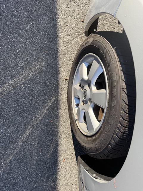 used 2010 Nissan Versa car, priced at $3,650