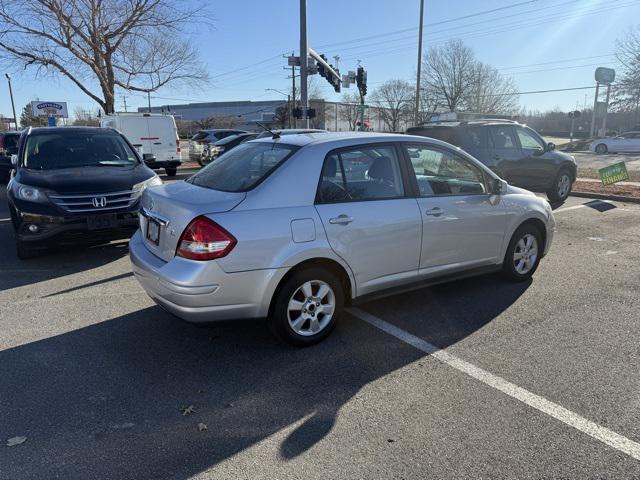 used 2010 Nissan Versa car, priced at $3,650