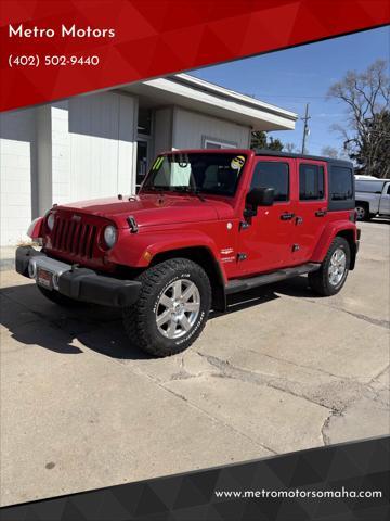 used 2011 Jeep Wrangler Unlimited car, priced at $9,999