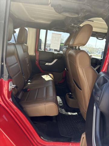 used 2011 Jeep Wrangler Unlimited car, priced at $9,999