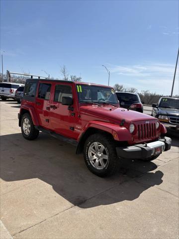 used 2011 Jeep Wrangler Unlimited car, priced at $9,999