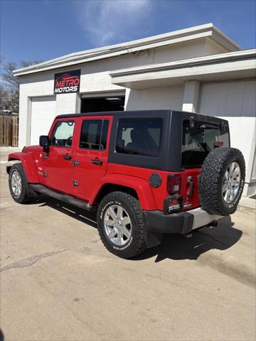 used 2011 Jeep Wrangler Unlimited car, priced at $9,999
