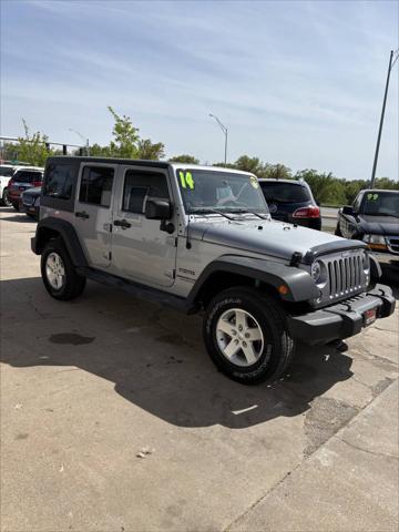 used 2014 Jeep Wrangler Unlimited car, priced at $14,446