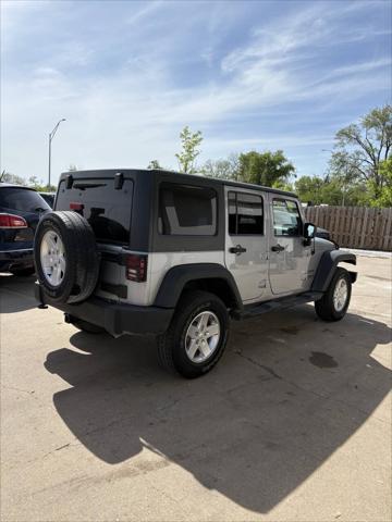 used 2014 Jeep Wrangler Unlimited car, priced at $14,446