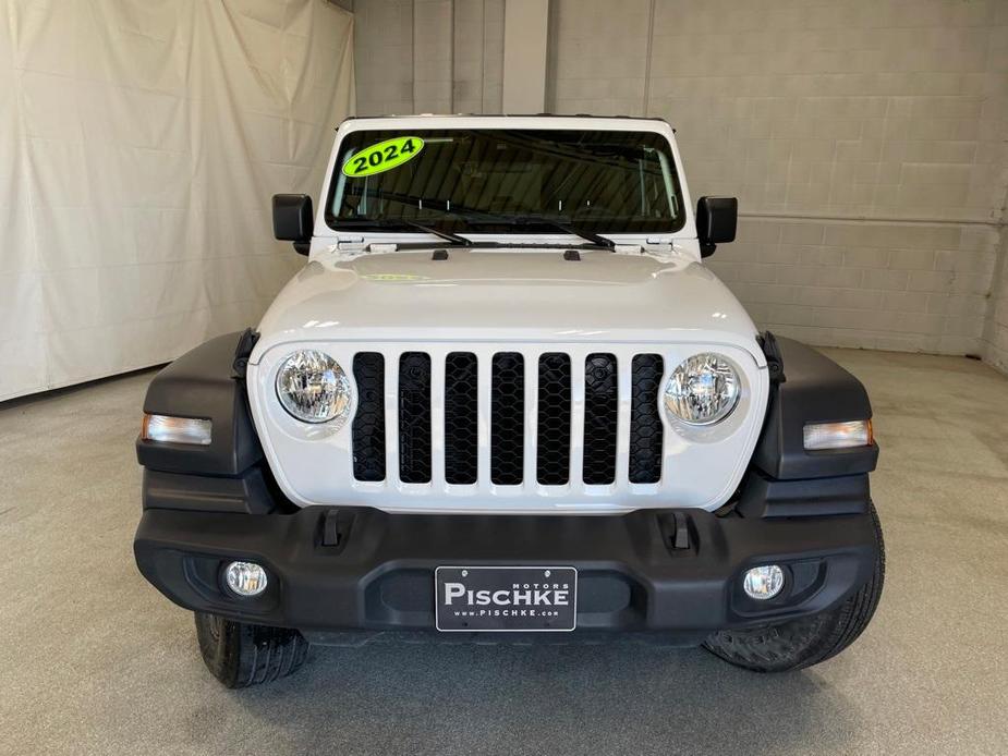 used 2024 Jeep Wrangler car, priced at $38,590