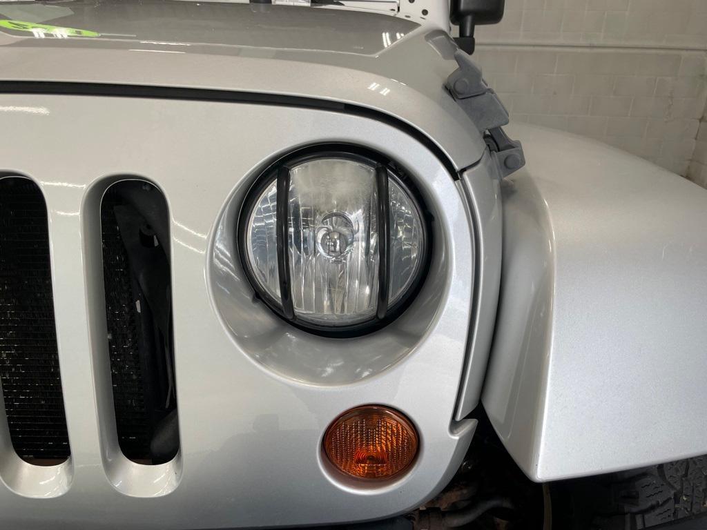used 2011 Jeep Wrangler Unlimited car, priced at $16,490