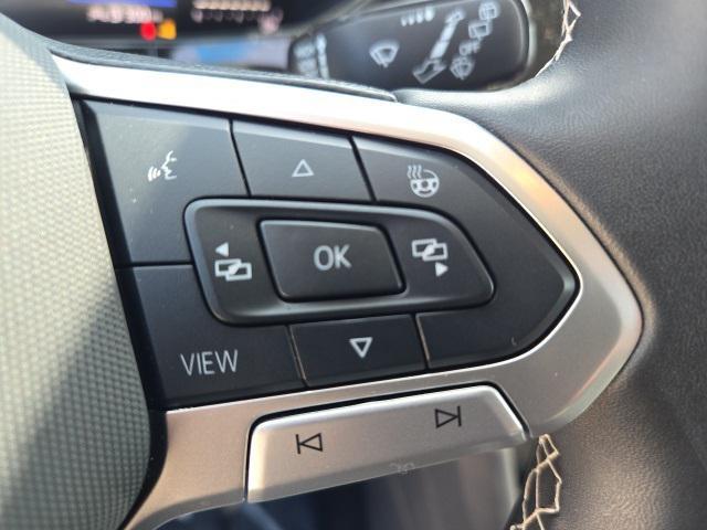 used 2024 Volkswagen Taos car, priced at $24,200