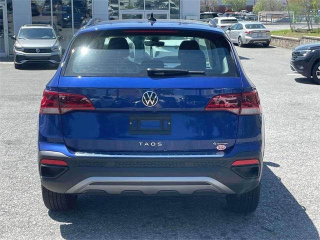used 2024 Volkswagen Taos car, priced at $24,300