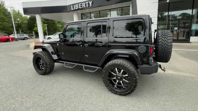 used 2015 Jeep Wrangler Unlimited car, priced at $32,832