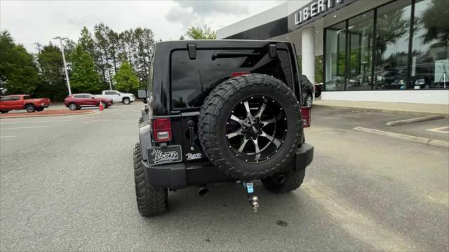 used 2015 Jeep Wrangler Unlimited car, priced at $32,515