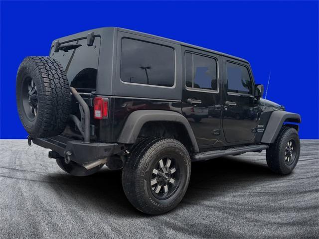 used 2015 Jeep Wrangler Unlimited car, priced at $17,477