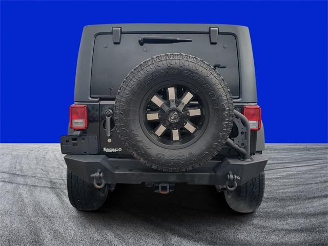 used 2015 Jeep Wrangler Unlimited car, priced at $17,477