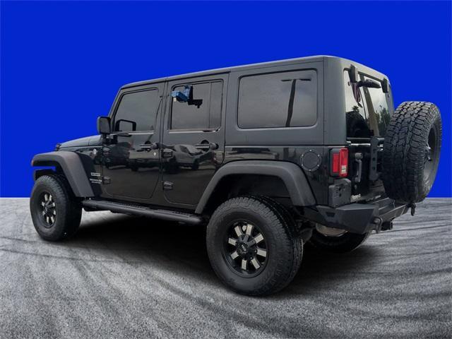 used 2015 Jeep Wrangler Unlimited car, priced at $17,477