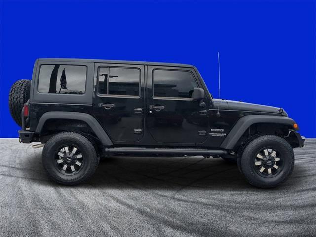 used 2015 Jeep Wrangler Unlimited car, priced at $17,477