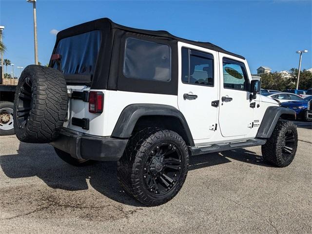 used 2014 Jeep Wrangler Unlimited car, priced at $14,399